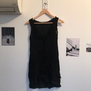 Elegant black dress with ruffle detail